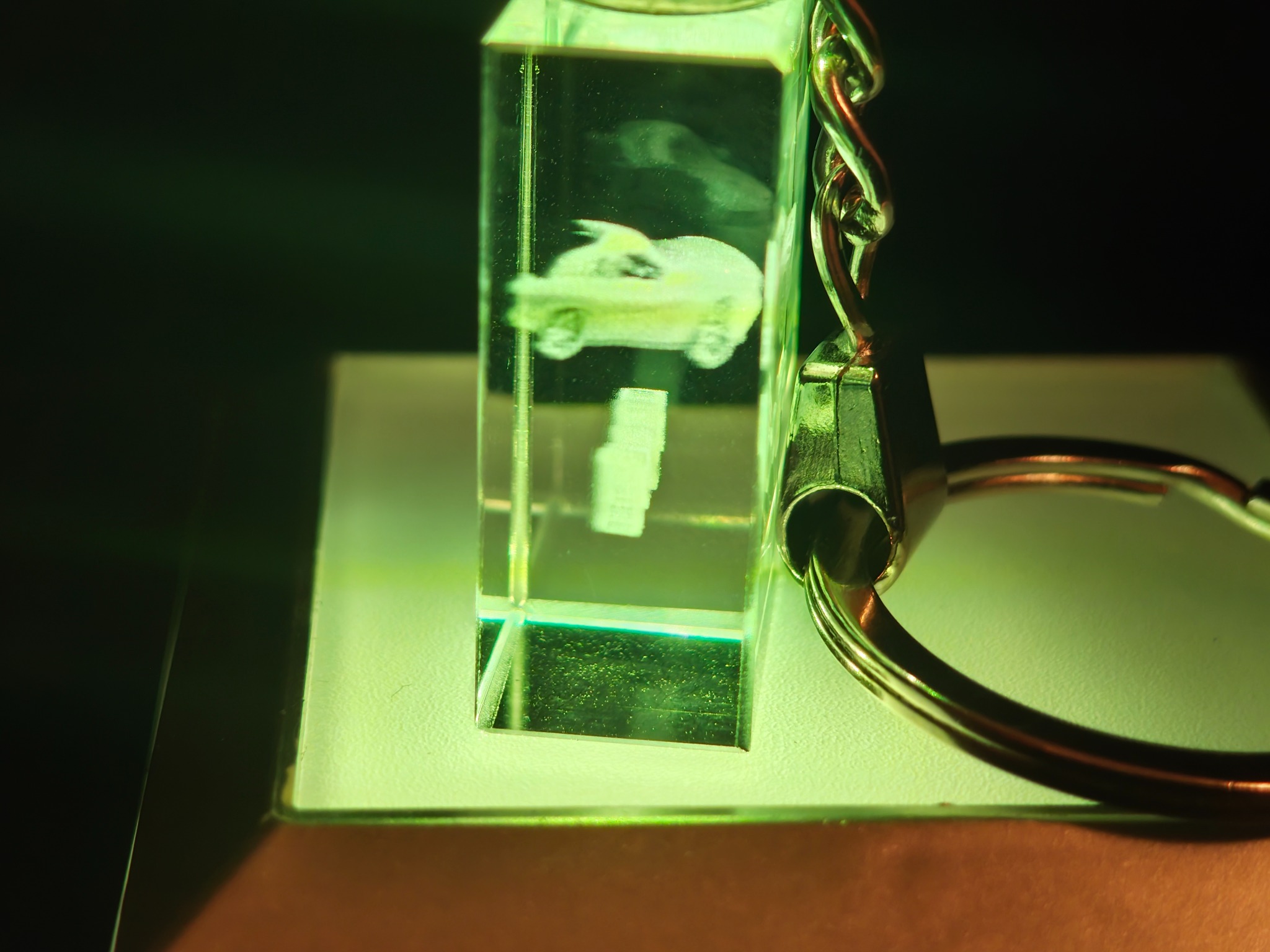 Vehicle engraved in a crystal photo keychain with green lighting